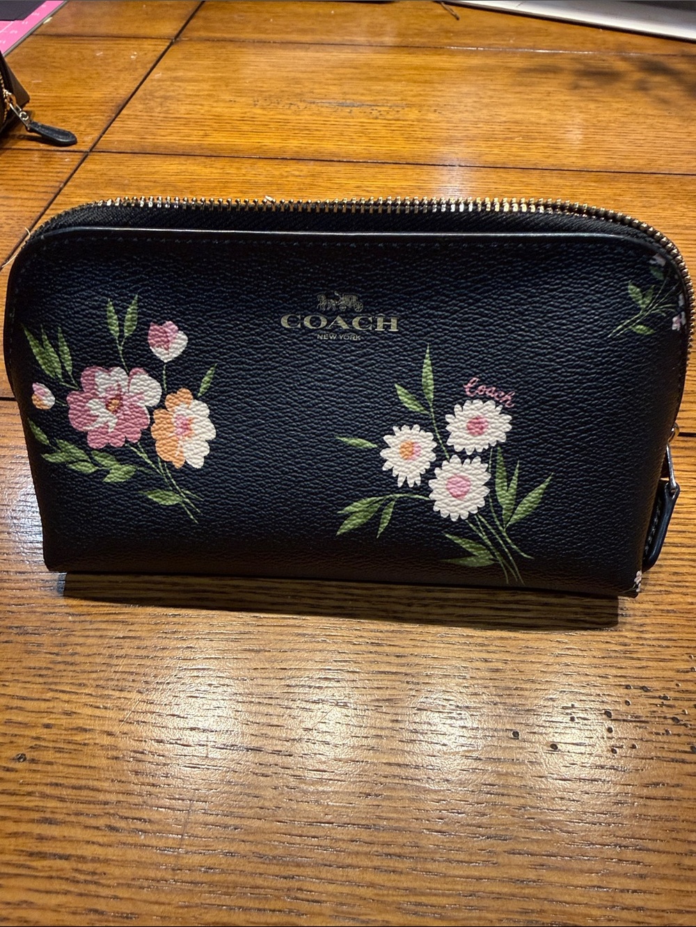 COACH Black Floral Zip around bag.